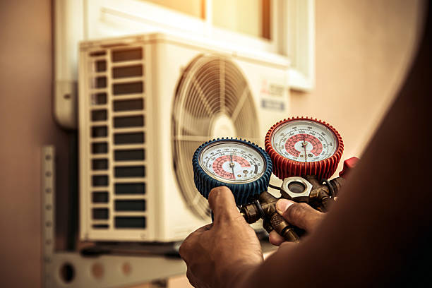Professional Air Conditioning Service technician working in Rosedale, NY